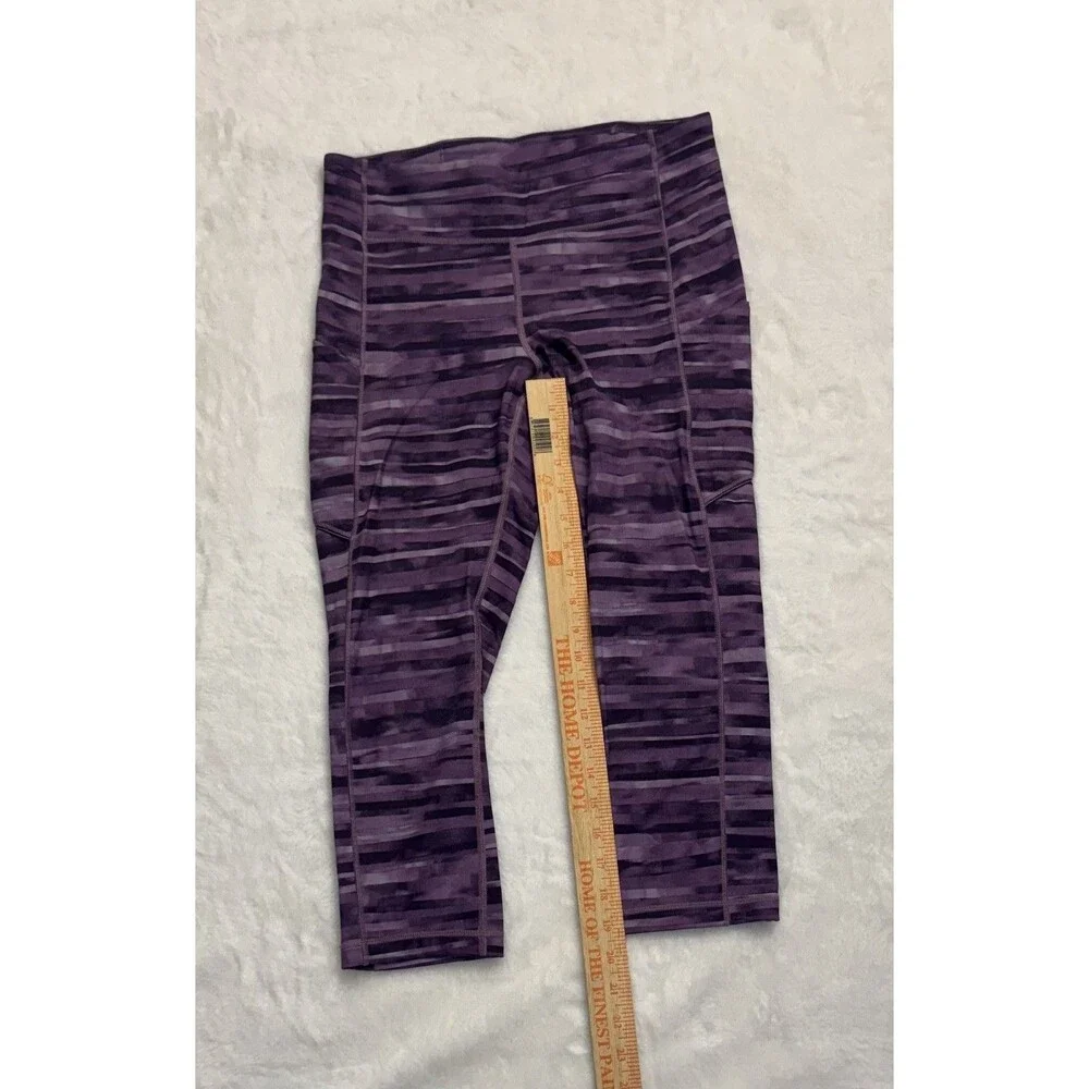 lululemon cropped purple leggings size 8 speed it up zip waist pocket